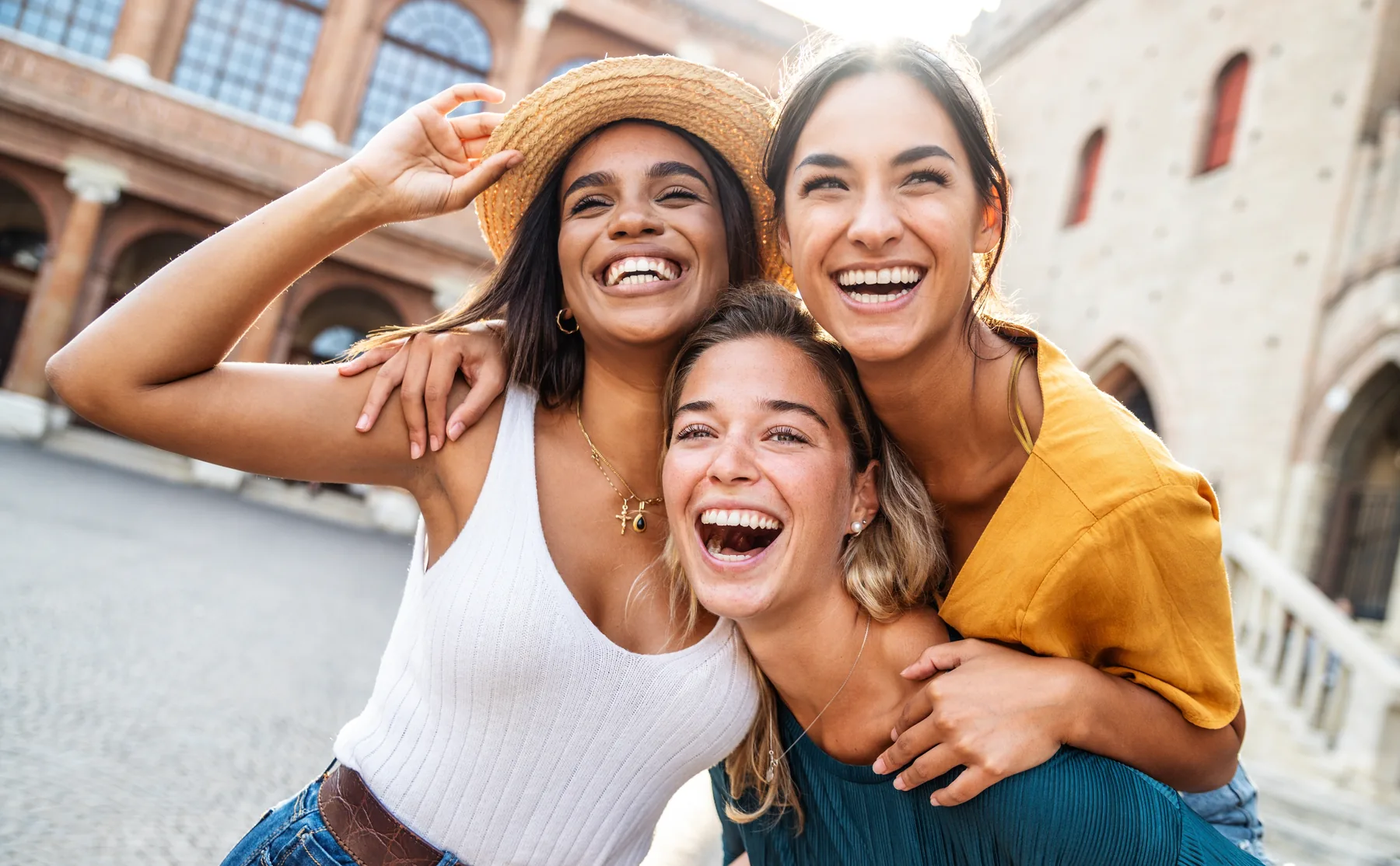 Smiling Friends Outdoors Smiling friends taking a selfie outdoors