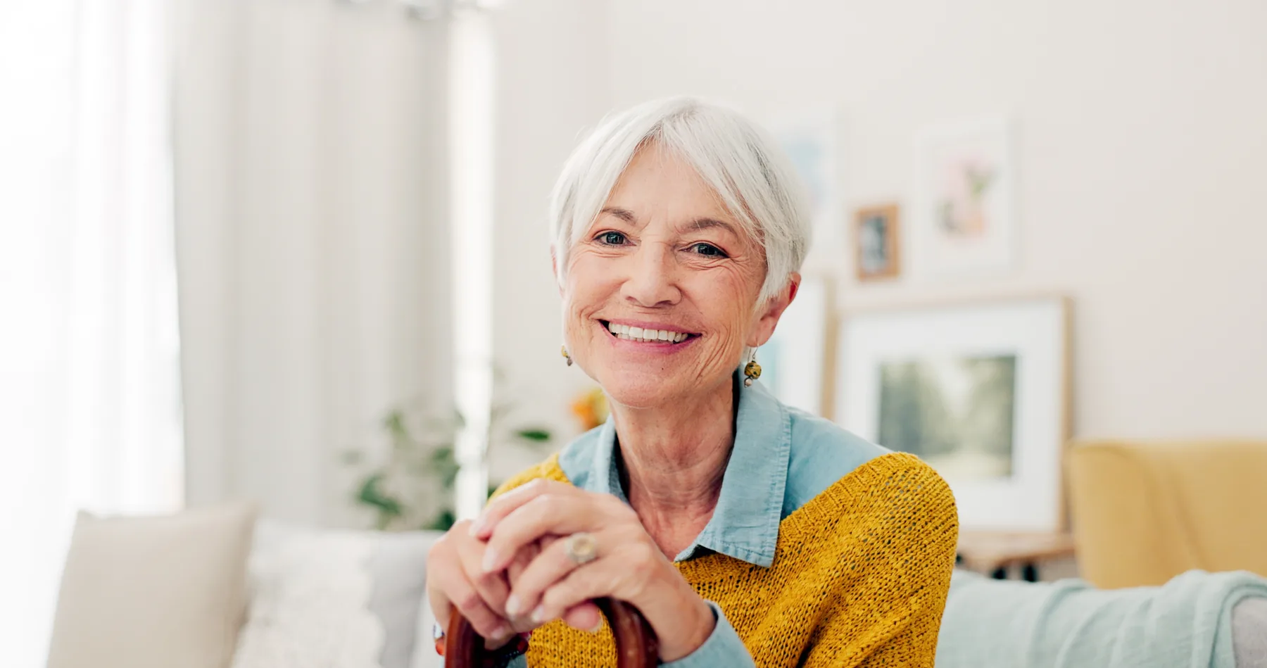 Smiling Senior Woman at Home Smiling senior woman in a bright home